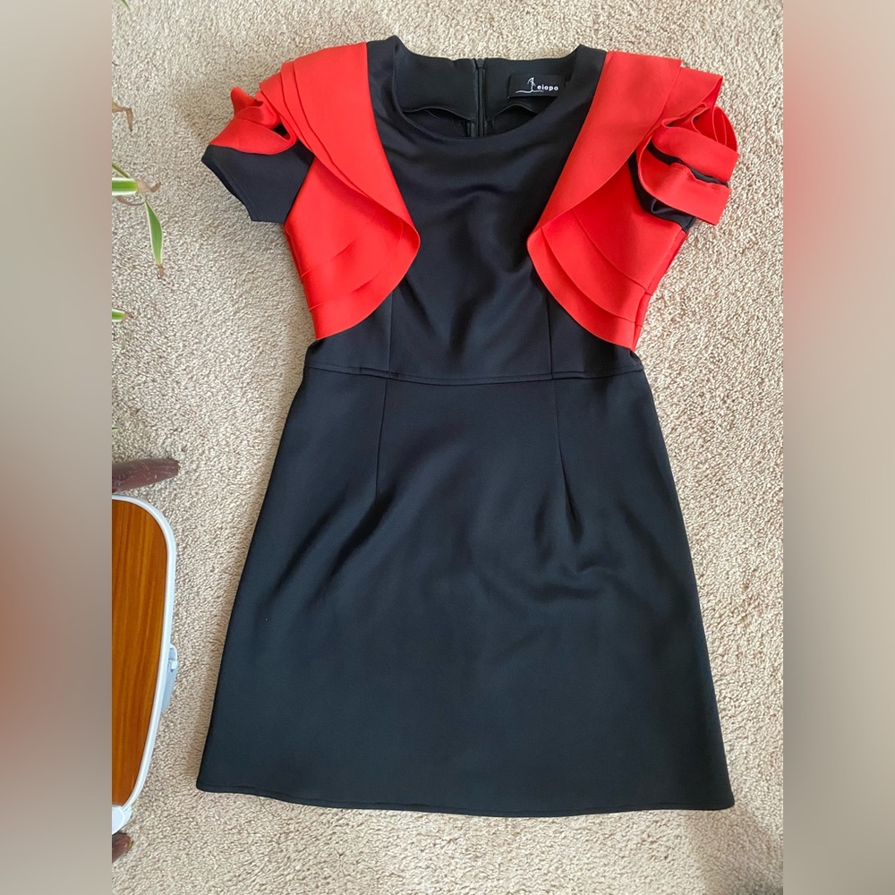 Black Dress with Red Ruffle Shoulder Detail